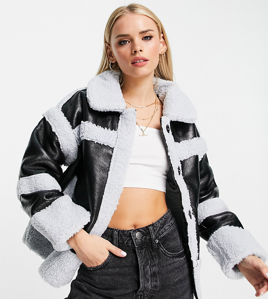 ASOS DESIGN Petite – Jacke in Schwarz und Blau mit Teddyfell-Einsätzen günstig online kaufen