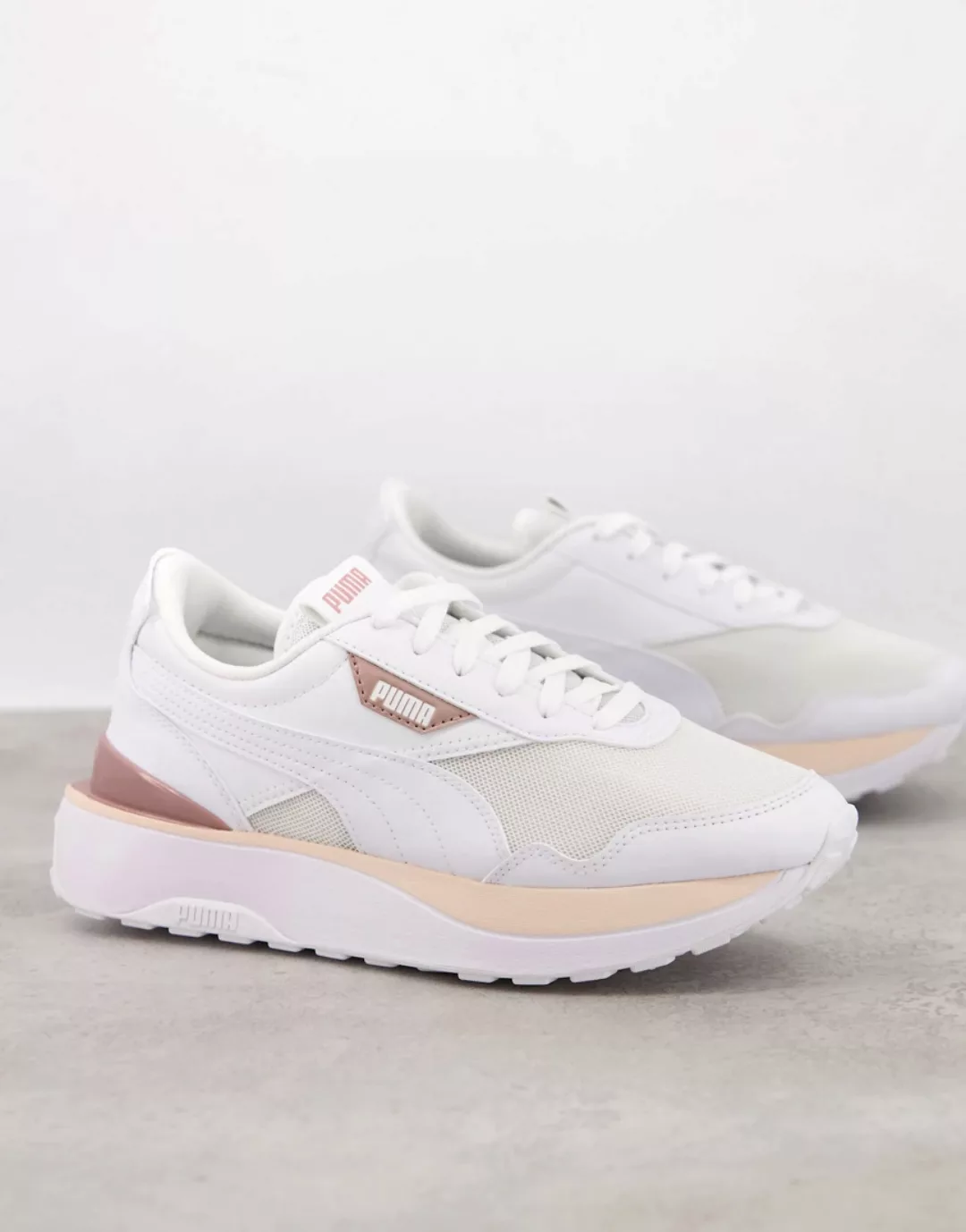 Puma – Cruise Rider – Sneaker in Weiß und Rosa günstig online kaufen