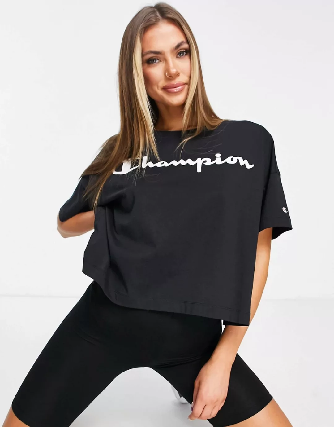 Champion – Kastenförmiges Oberteil mit kurzem Schnitt in Schwarz günstig online kaufen
