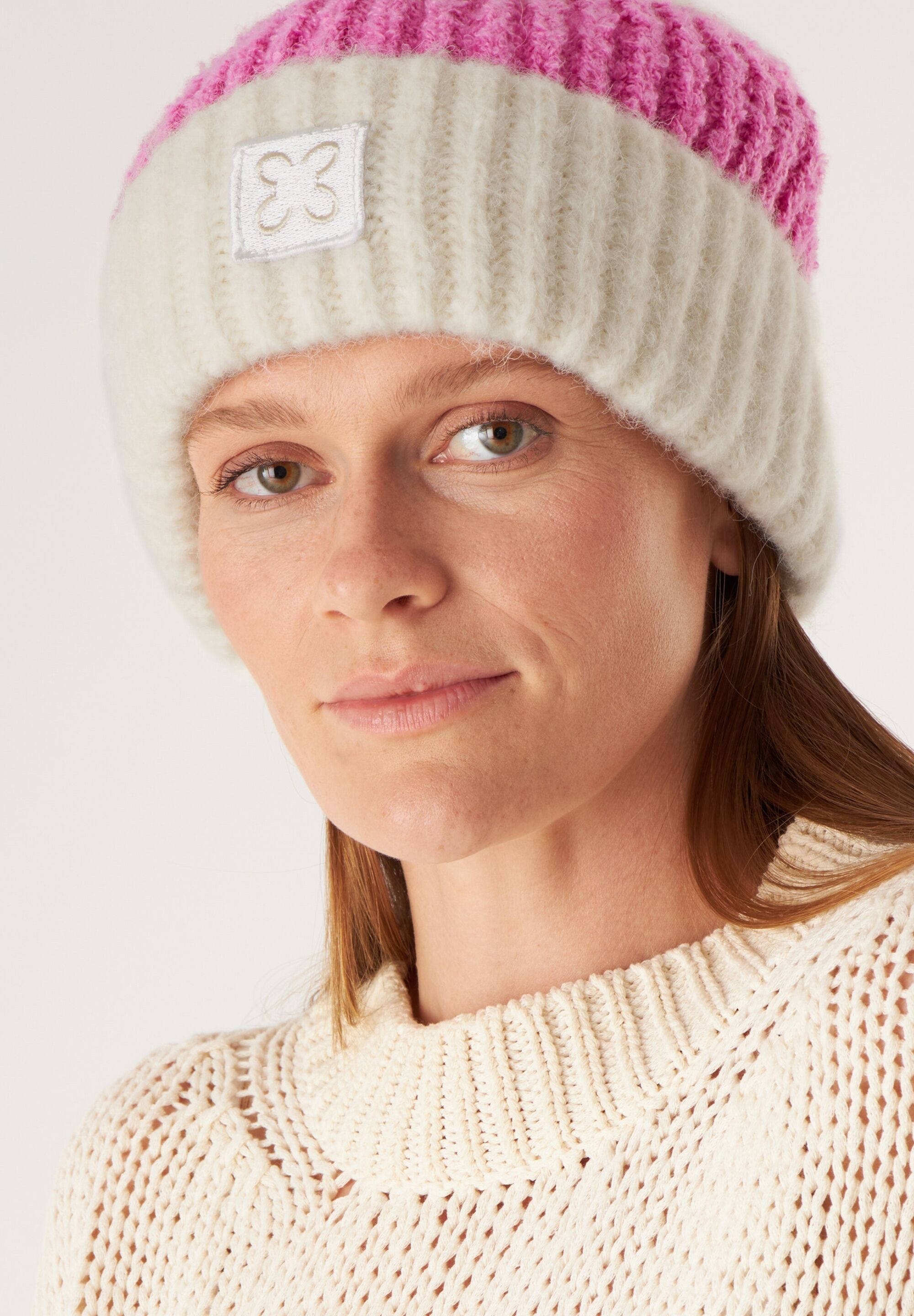Codello Strickmütze aus Bouclé- und Rippstrick günstig online kaufen