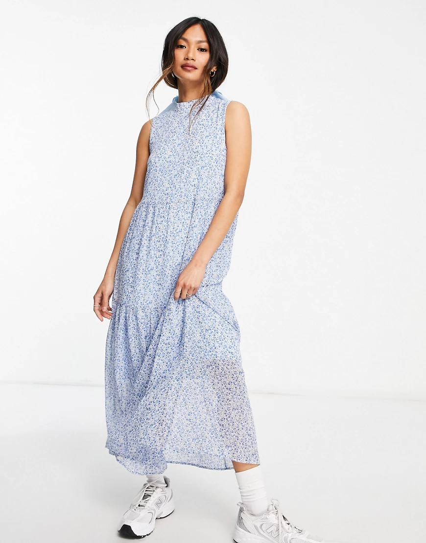 Vero Moda – Aware – Ärmelloses Midi-Wickelkleid in Blau mit Blumenmuster-Me günstig online kaufen