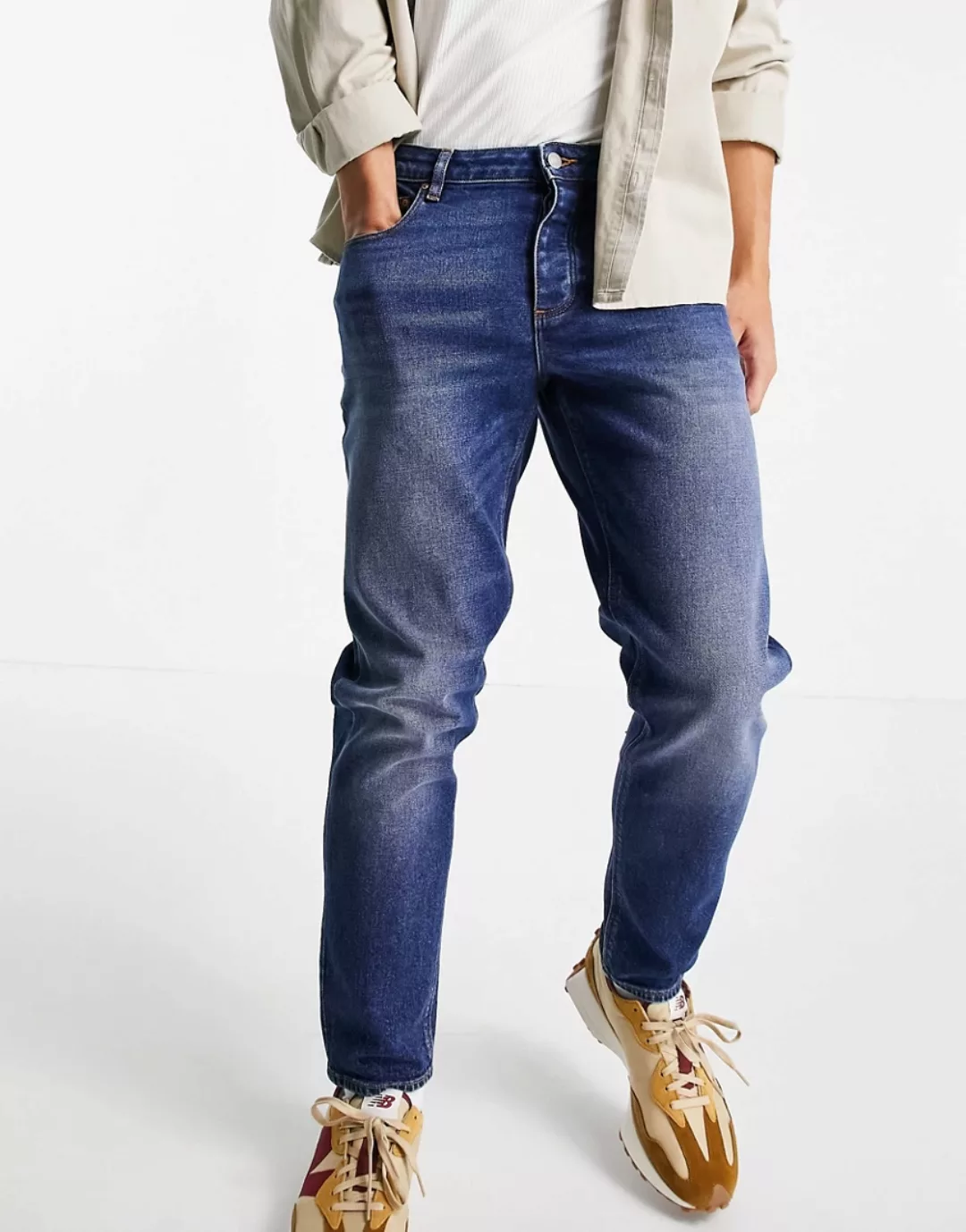 ASOS DESIGN – Schmal zulaufende Stretch-Jeans in vintageblauer Waschung günstig online kaufen