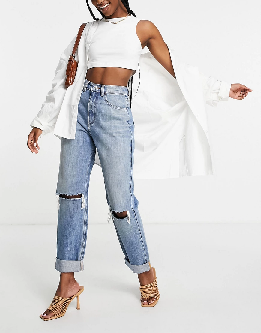 ASOS DESIGN – Locker geschnittene Mom-Jeans in Stone-Waschung mit hohem Bun günstig online kaufen