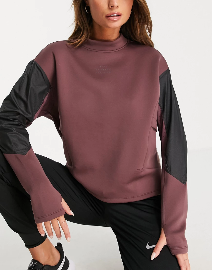 Nike – Run Division Dri-FIT – Sweatshirt in Lila mit Rundhalsausschnitt günstig online kaufen