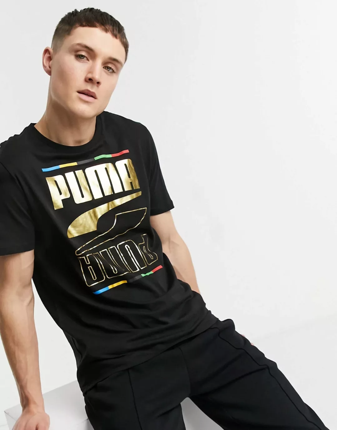 Puma – Rebel – T-Shirt im olympischen 5-Kontinente-Design in Schwarz günstig online kaufen