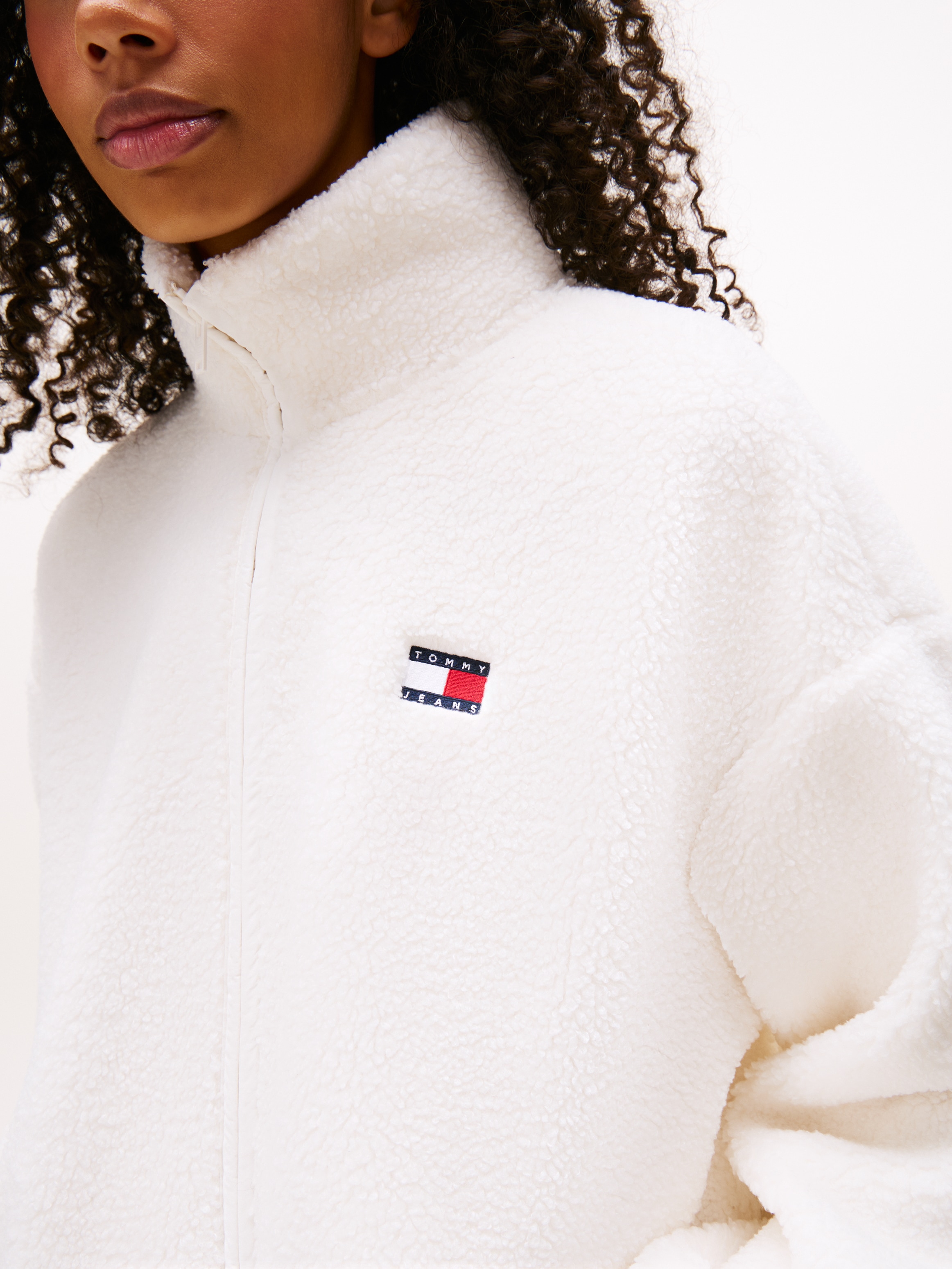Tommy Jeans Sweatjacke "TJW ZIP THROUGH BADGE TEDDY" günstig online kaufen