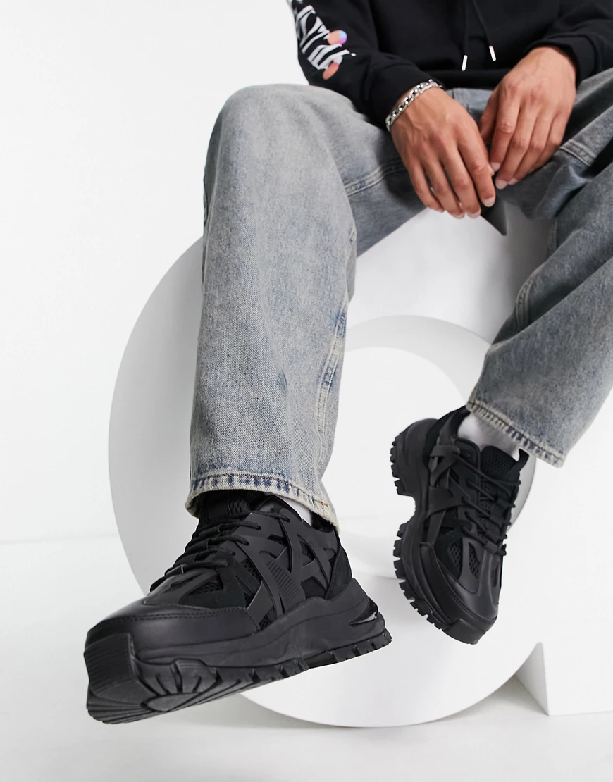 ASOS DESIGN – Schwarze Sneaker mit vielen Gummieinsätzen und klobiger Sohle günstig online kaufen